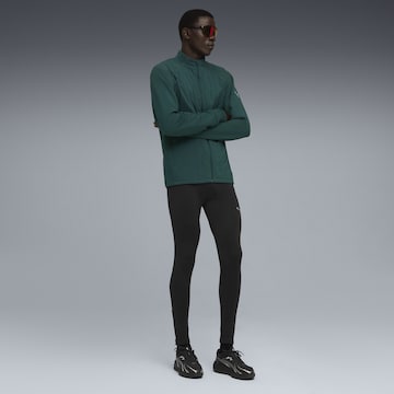 PUMA Skinny Sports trousers in Black