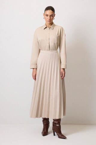 Touche Prive Rock in Beige
