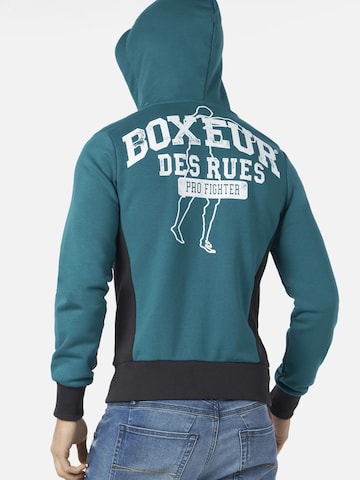 Boxeur des Rues - Sudadera 'Herren Hoodie Fitted Boxeur des Rues mit Reißverschluss und Kapuze, Petrolblau, Weißes Logo, Baumwolle' en azul