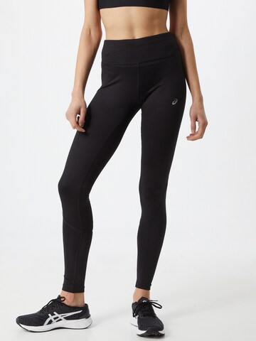 Skinny Pantalon de sport ASICS en noir : devant