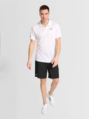 T-Shirt fonctionnel 'Court' Hummel en blanc
