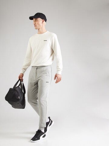 Tapered Pantaloni sportivi 'ESSENTIAL 4' di BJÖRN BORG in grigio