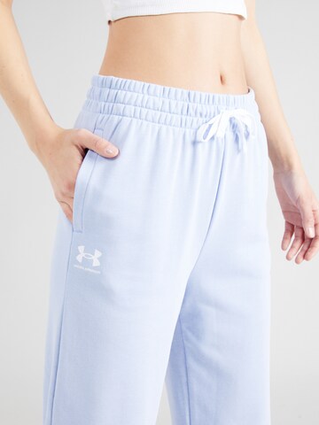 Effilé Pantalon de sport UNDER ARMOUR en bleu