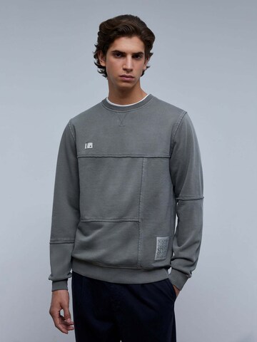 Sweat-shirt Scalpers en gris : devant