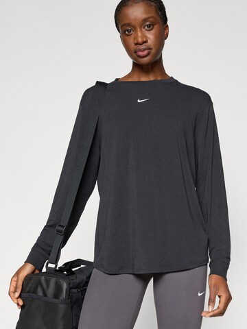 NIKE Toiminnallinen paita 'ONE' värissä musta
