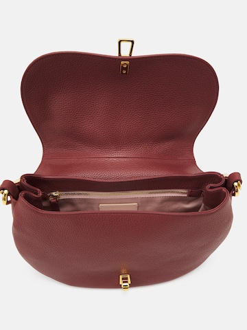 Geantă de umăr 'MAGIE SOFT' de la Coccinelle pe roșu: sus