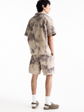 Pull&Bear Ohlapna forma Hlače | siva barva