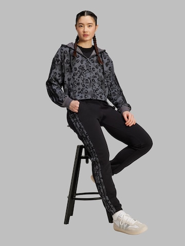 Tapered Pantaloni sport de la ADIDAS SPORTSWEAR pe negru