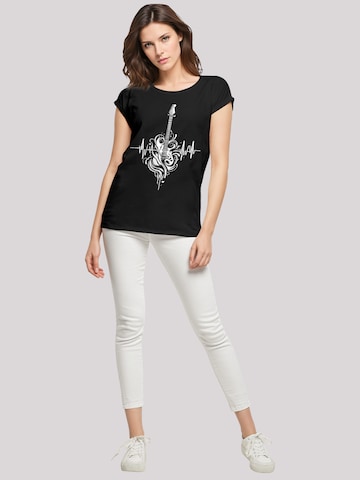 T-shirt 'Gitarre Heartbeat' F4NT4STIC en noir