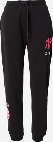 Champion Authentic Athletic Apparel Tapered Trousers in Black: front