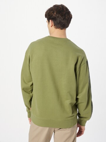 LEVI'S ® Sweatshirt 'Relaxd Graphic Crew' in Grün