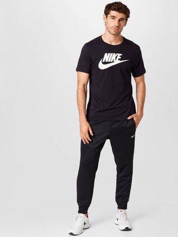 Nike Sportswear Tapered Trousers in Black