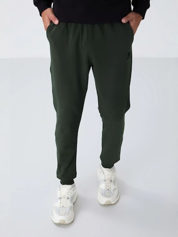 Regular Pantalon Tommy Life en vert : devant