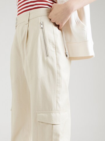Tapered Pantaloni cargo di Tommy Jeans in beige
