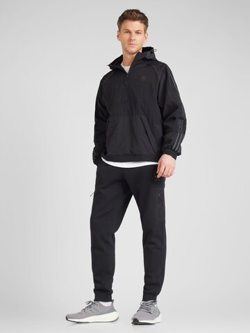 ADIDAS ORIGINALS Tapered Trousers in Black