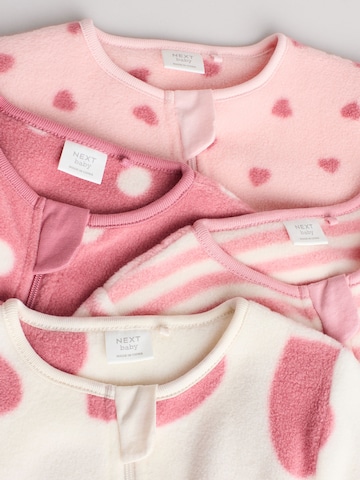 Pijamale de la Next pe roz