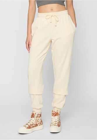 Tapered Pantaloni di Urban Classics in beige: frontale
