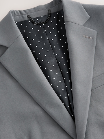 Next Slim fit Business-colbert 'Motionflex' in Grijs