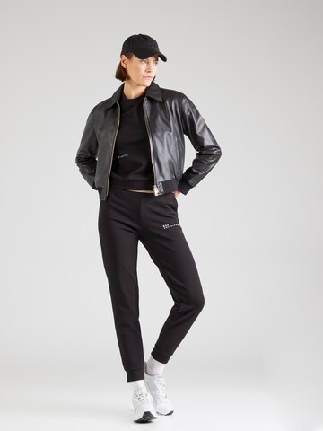 Tuta da jogging 'NATURAL VENTUS7' di EA7 Emporio Armani in nero