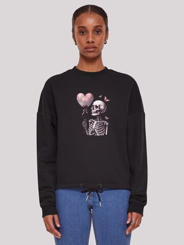 Sweat-shirt 'Skelett Hält Herzballon' F4NT4STIC en noir : devant