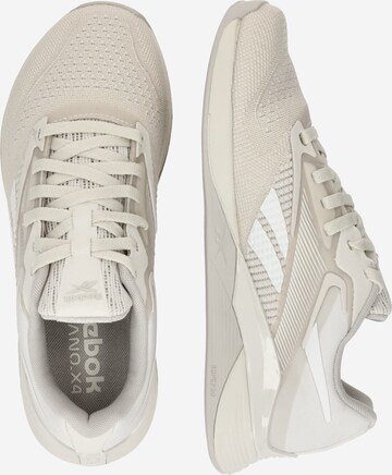 Reebok - Sapatilha de desporto 'NANO X4' em bege