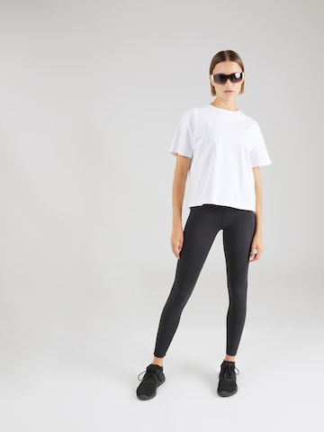 Skinny Pantaloni sportivi di aim'n in nero