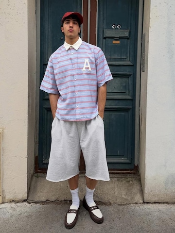 Bershka Baggy Housut värissä harmaa