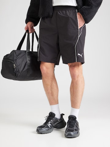Regular Pantaloni sport de la PUMA pe negru: față
