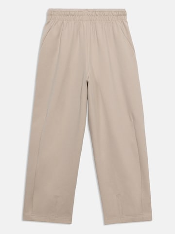 NIKE Loosefit Sporthose in Beige