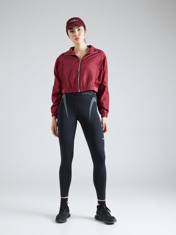 NIKE Skinny Sporthose in Schwarz