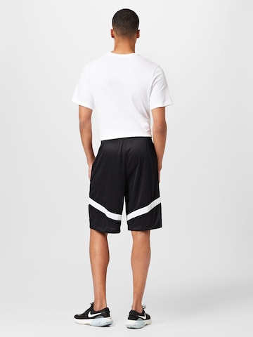 NIKE Regular Sports trousers in Black