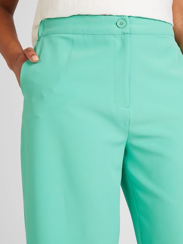 Wide leg Pantaloni 'CHEETAH' di ONLY Carmakoma in verde