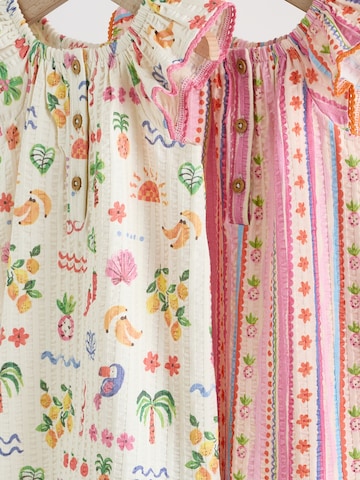 Ensemble Next en mélange de couleurs