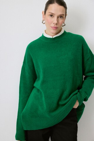 Touche Prive Pullover in Grün: Vorderseite
