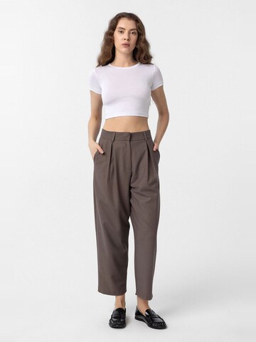 ruda Antioch „Baggy“ Klostuotos kelnės 'Laura'