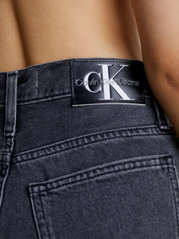 Calvin Klein Jeans جينز واسع جينز بلون أسود