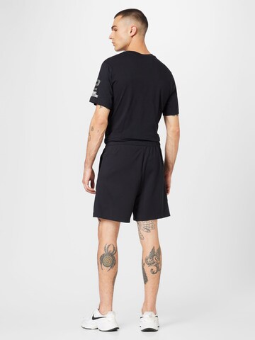 Nike Sportswear - Loosefit Calças em preto