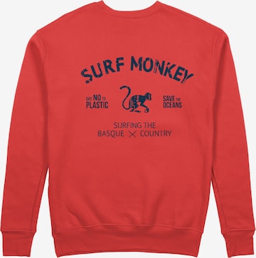 Sweat-shirt 'Rette das Ozean' Surf Monkey en rouge : devant