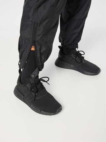 ADIDAS BY STELLA MCCARTNEY Tapered Workout Pants 'Lined Winter' in Black