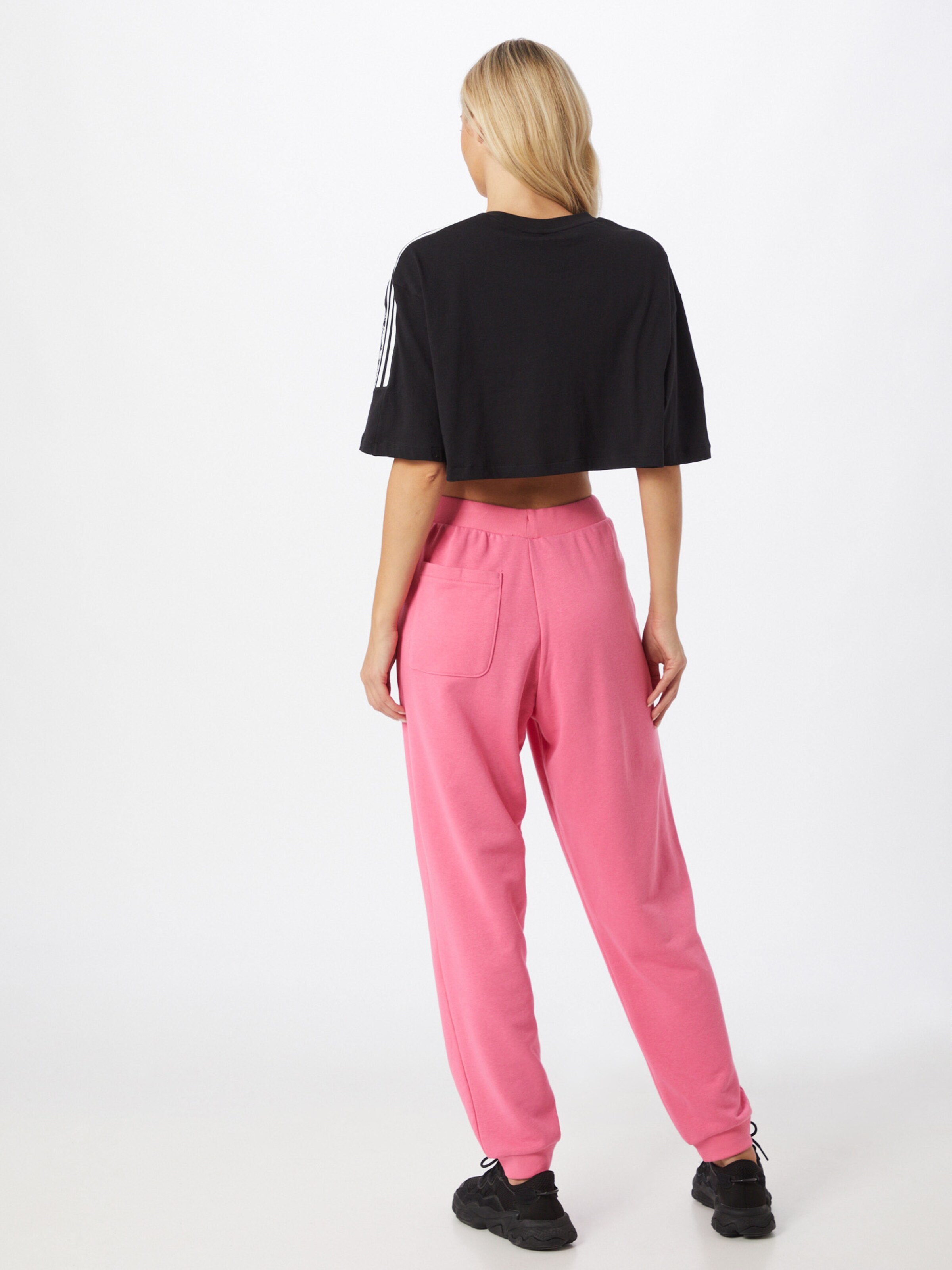 ADIDAS ORIGINALS Tapered Broek Trefoil Essentials in Lichtroze ABOUT YOU