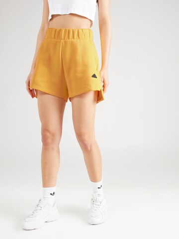 ADIDAS SPORTSWEAR Широка кройка Спортен панталон 'Z.N.E.' в жълто: отпред