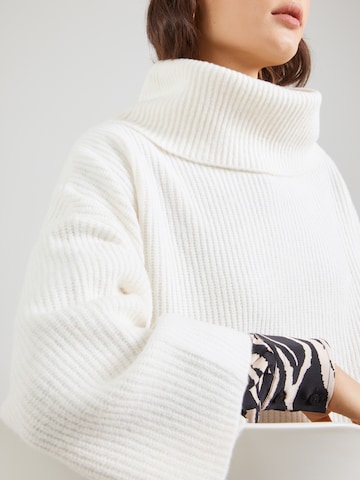 COMMA Pláštěnka – béžová