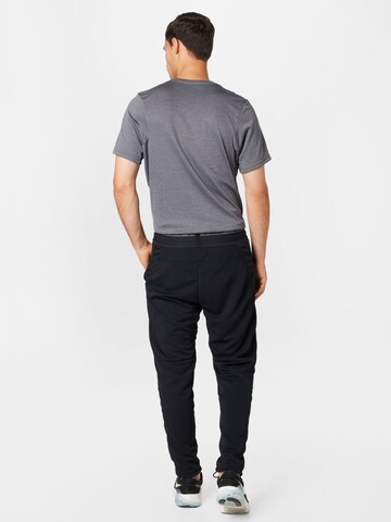 NIKE Regular Sports trousers in Black