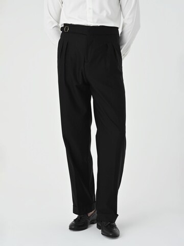 Antioch Regular Pleat-front trousers in Black: front