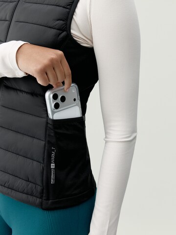 Skinny Gilet de sport ' Vortex ' Born en noir