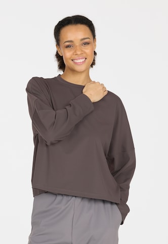 Athlecia Sports sweatshirt in Purple: front