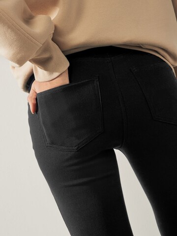 Next Skinny Jeggings in Schwarz