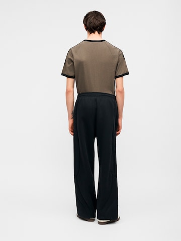 Wide Leg Pantalon 'Teamgeist 26' ADIDAS ORIGINALS en noir