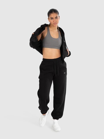 Loosefit Pantalon 'Zina' Smilodox en noir