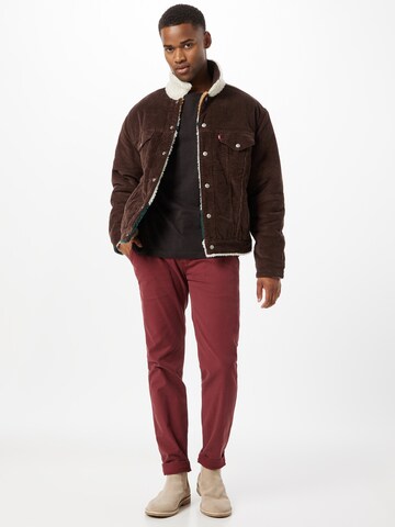 LEVI'S ® Between-Season Jacket 'Levi's® Men's Reversible Vintage Fit Sherpa Trucker Jacket' in Brown